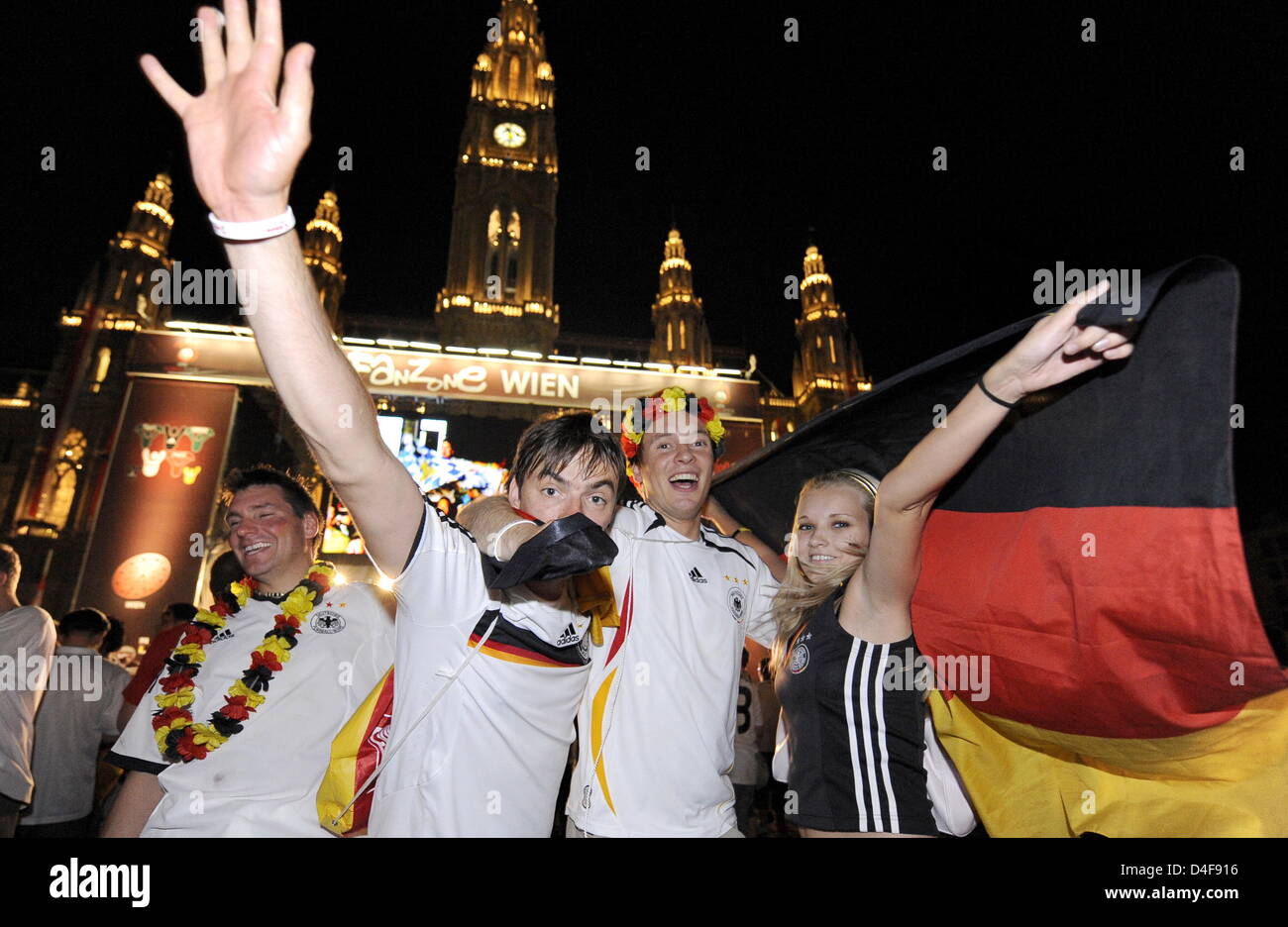 German supporters celebrating in the fanzone in Vienna, Austria on 19 June 2008, after Germany defeated Portugal with 3-2 in their quarter final match. Photo: Achim Scheidemann dpa +++###dpa###+++ Stock Photo