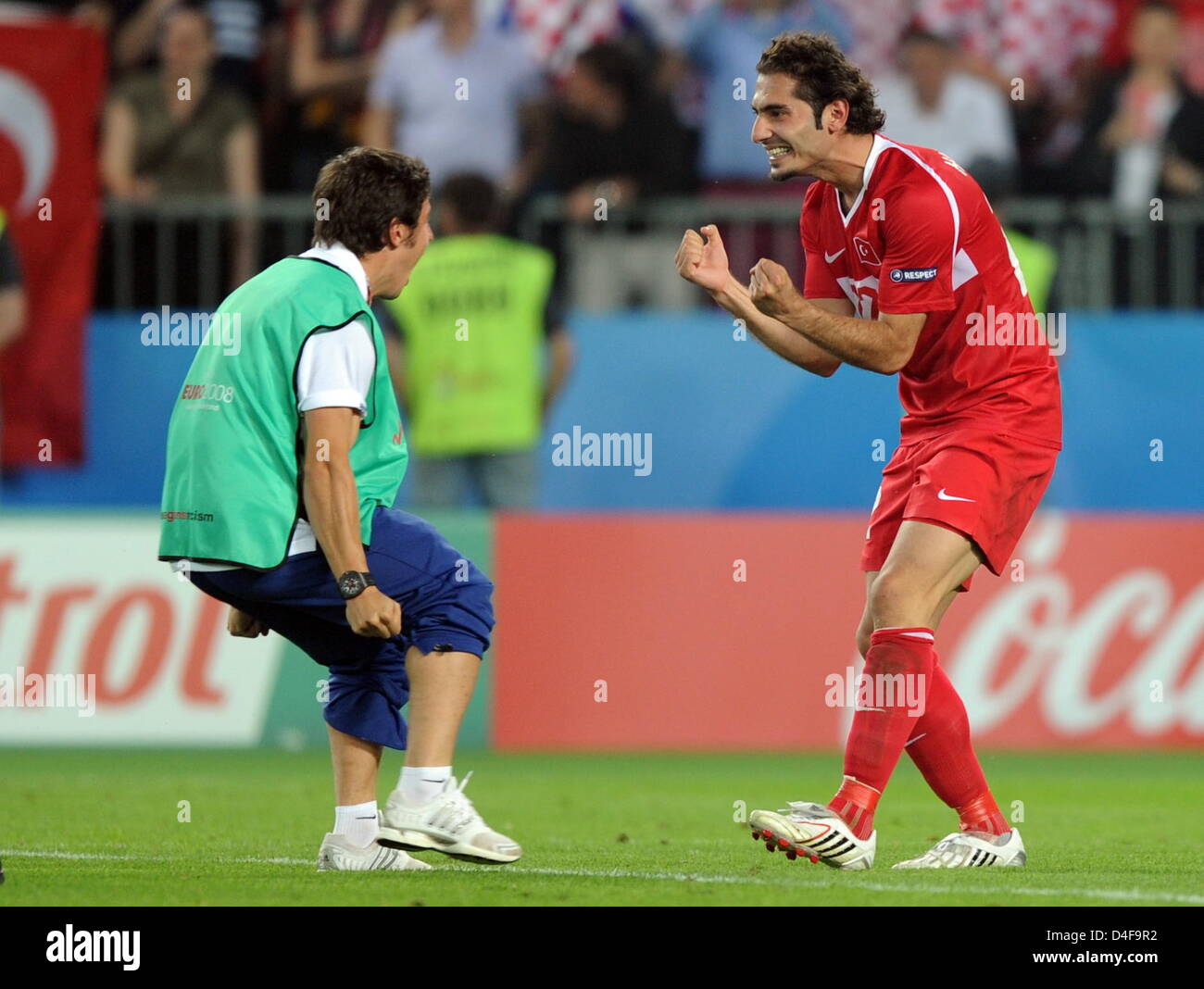 Hamit Altintop of Turkey jubilates with a teammate after the UEFA EURO 2008 quarter final match between Croatia and Turkey at the Ernst Happel stadium in Vienna, Austria, 20 June 2008. Turkey won 1:3 in penalty shootout. Photo: Achim Scheidemann dpa +please note UEFA restrictions particulary in regard to slide shows and 'No Mobile Services'+ +++(c) dpa - Bildfunk+++ Stock Photo