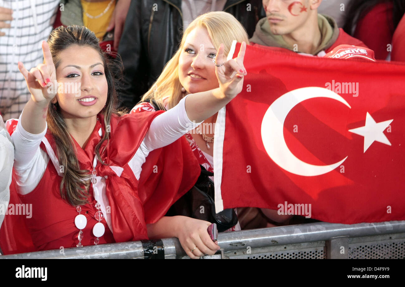 Turkish fans celebrate at the quarter final match of the Euro 2008 Turkey  vs Croatia at the 'fan-fest' in Hamburg, Germany, 20 June 2008. Thousands  of visitors watched the match at the '