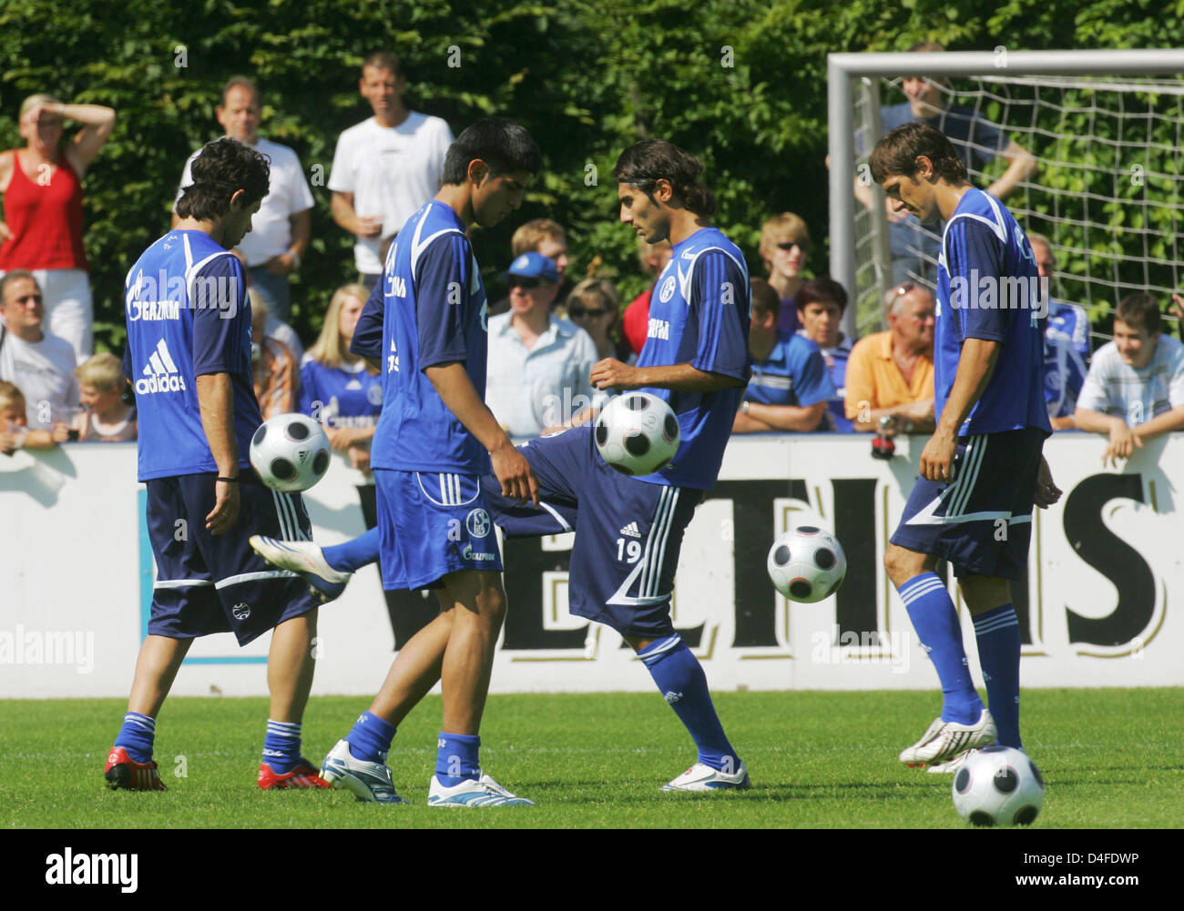 Players of FC Schalke 04 Rafinha (L-R), Carlos Zambrano, Halil Altintop and Mladen Krstajic are pictured during the kick-off training at the club's training grounds in Gelsenkirchen, Germany, 01 July 2008. The Bundesliga season 2008/2009 starts on 15 August. Photo: Bernd Thissen Stock Photo