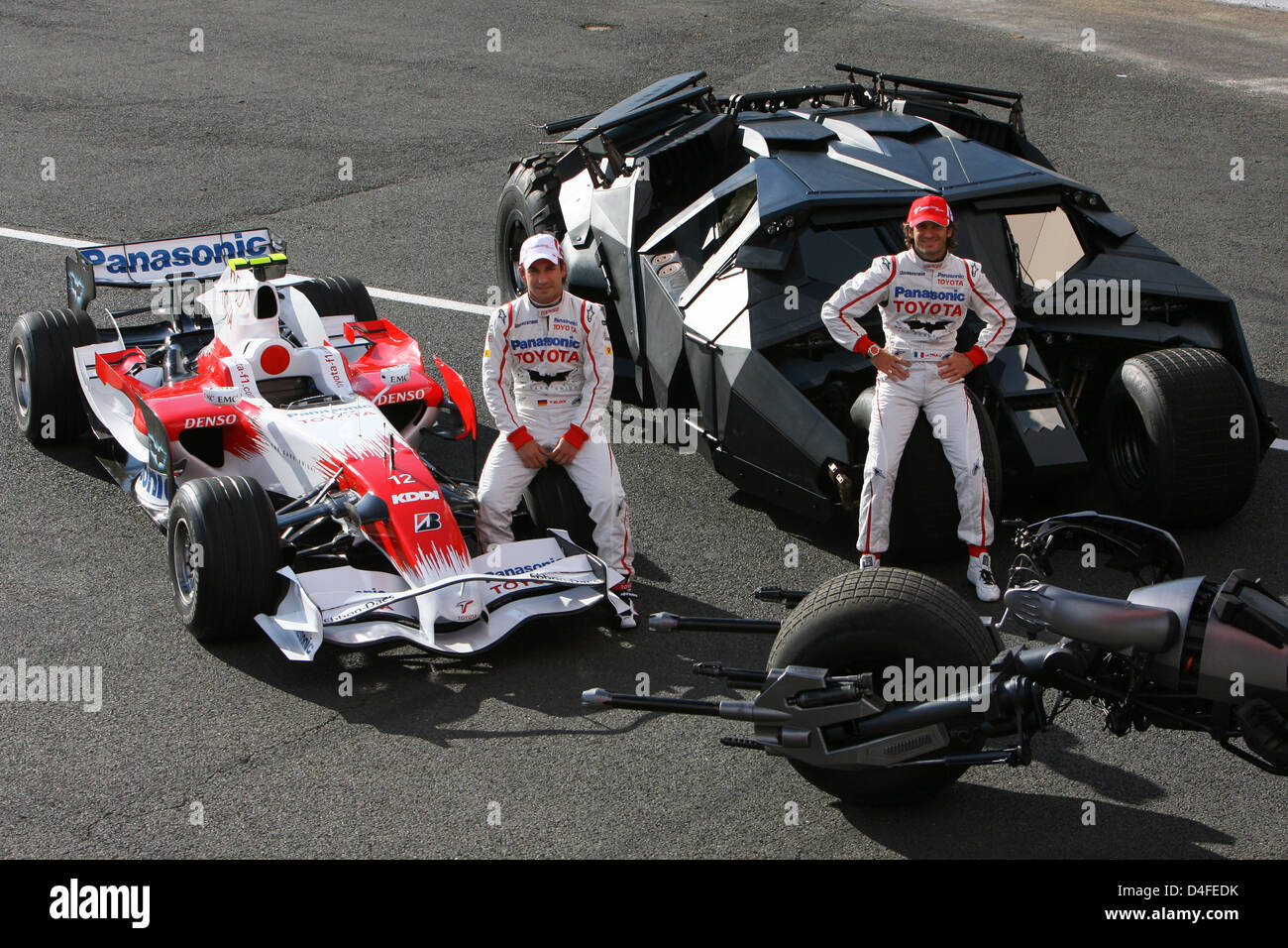 Italian Formula One driver Jarno Trulli (R) and German Formula One 