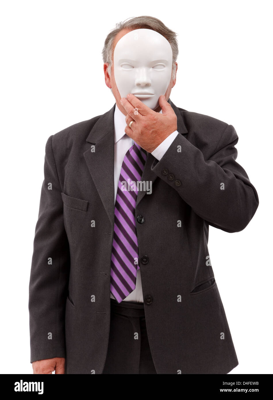 Business man covering his face with white mask Stock Photo