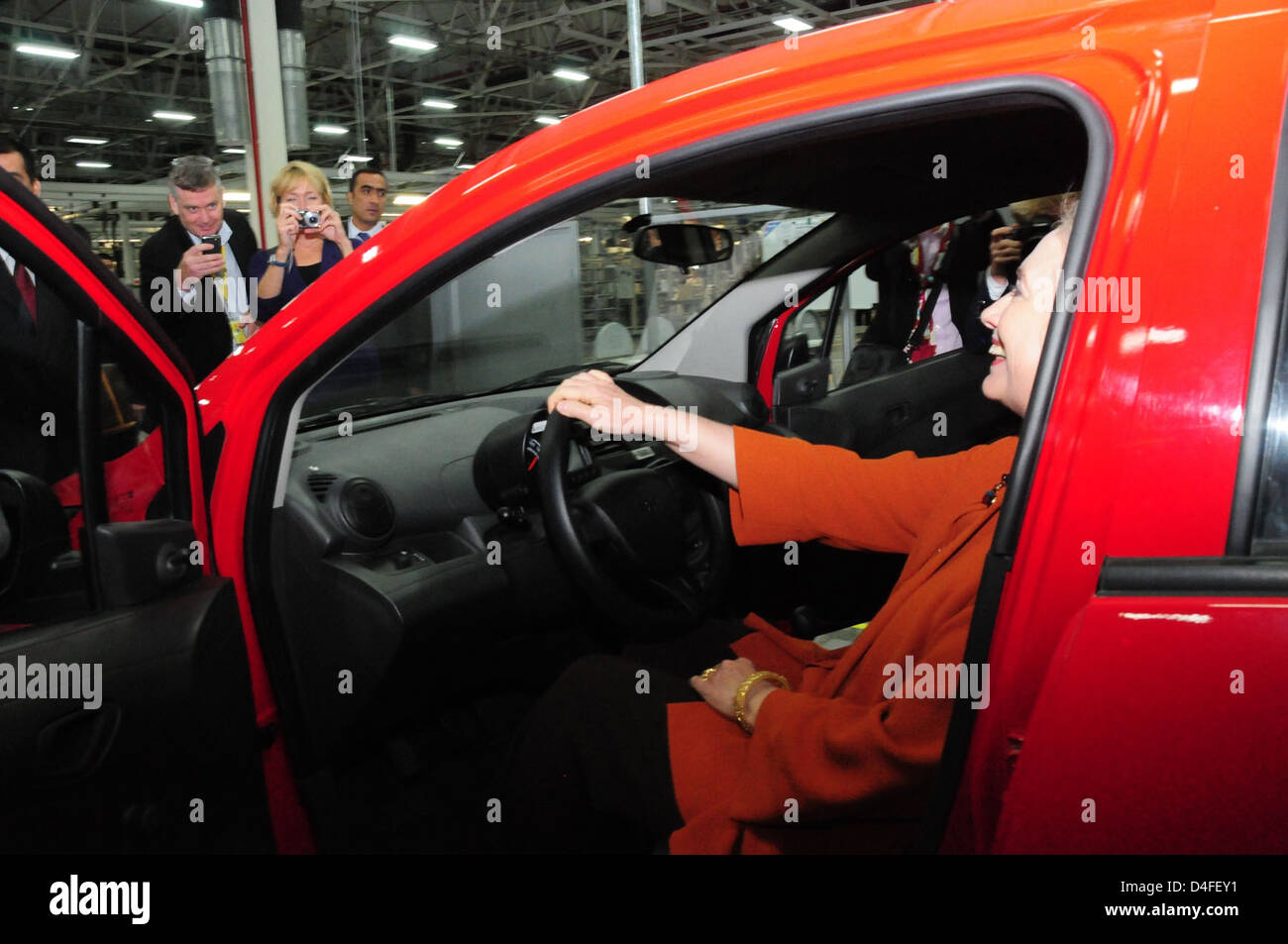 Secretary Clinton Sits Behind the Wheel of a Chevrolet Spark Stock Photo
