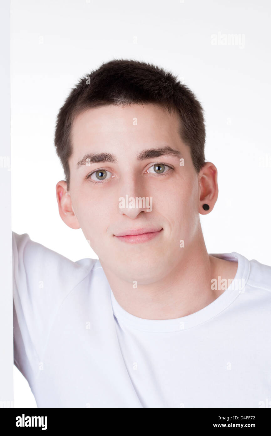 portrait of a young man with dark hair looking Stock Photo