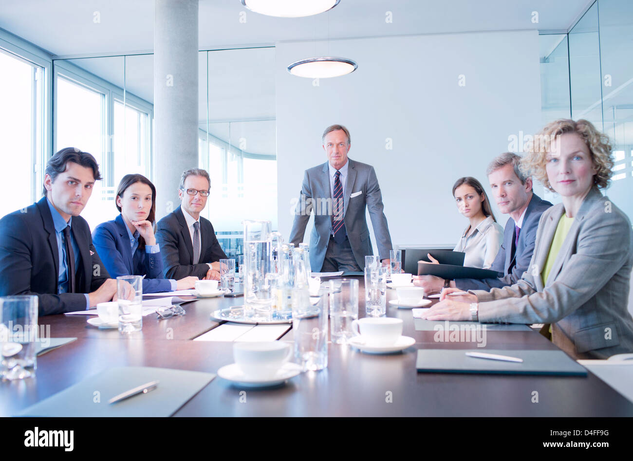 Business people sitting in meeting Stock Photo - Alamy