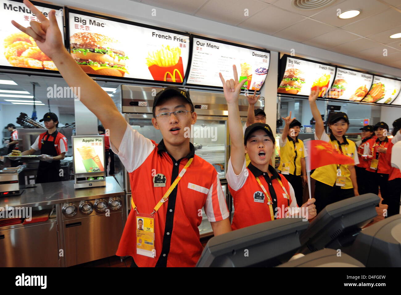 Employees of McDonalds gesture in the dining room in the Olympic ...