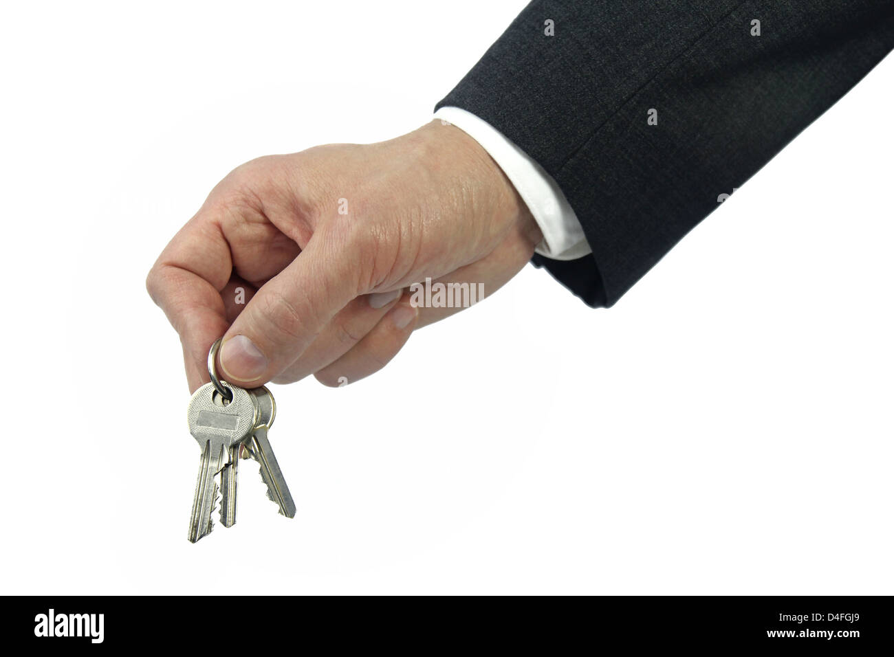 business hand holding keys isolated on white background Stock Photo Alamy