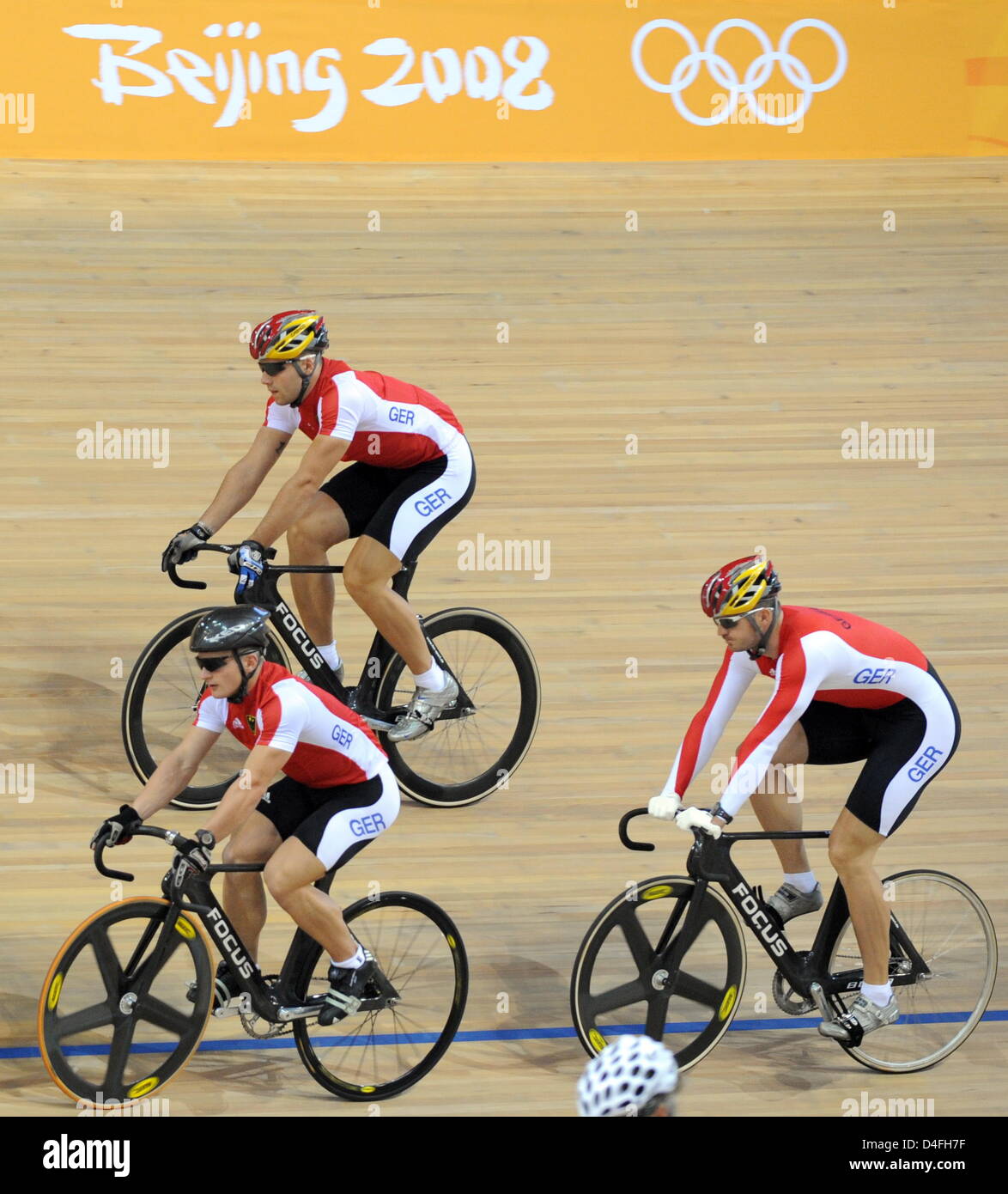 Rene Enders (L-R), Maximilian Levy and Carsten Bergemann of the German track cycling team trains in the Laoshan Velodrome in preparation of the Beijing 2008 Olympic Games, Beijing, China, 7 August 2008. Photo: Peer Grimm (c) dpa - Bildfunk Stock Photo