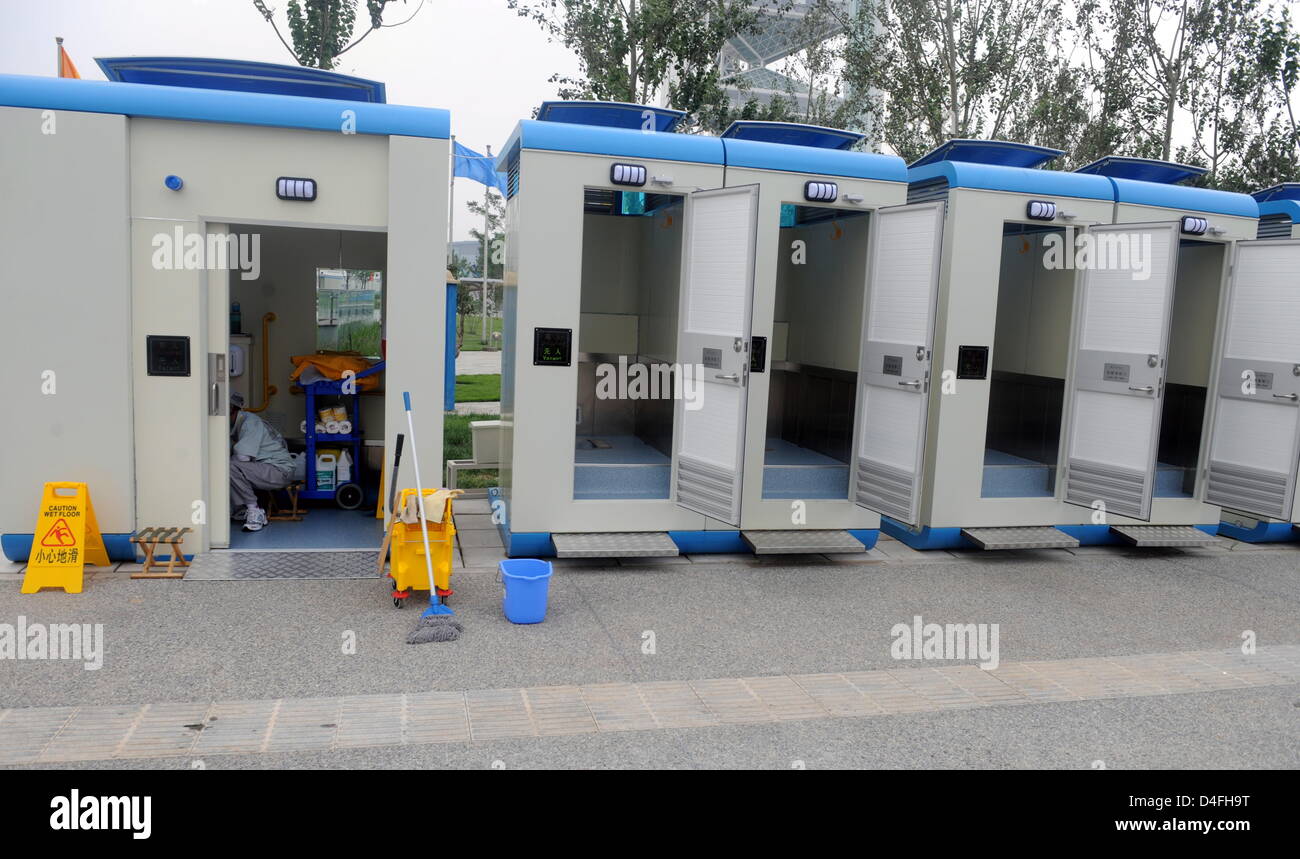 Some portable toilets are seen in front of the National Stadium ahead