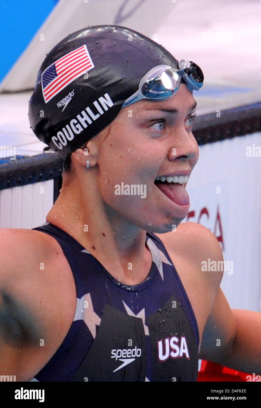 US swimmer Natalie Coughlin reacts after her win in the women's 100m  backstroke final during the 2008 Beijing Olympics swimming finals at the  National Aquatics Center in Beijing, China, 12 August 2008., image size:888x1390