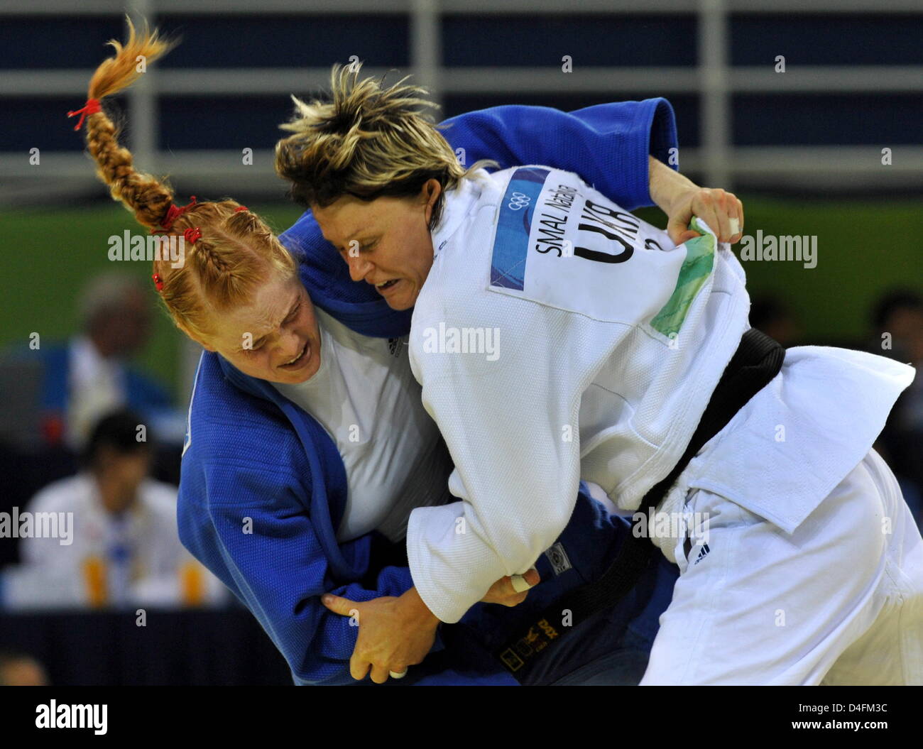 Boehm of Germany wins against Nataliya Smal (R) of Ukraine in
