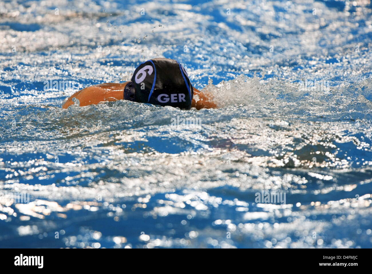 German Marc Politze competes during the preliminary round match in the men's water polo competition in the Yingdong Natatorium at the Beijing 2008 Olympic Games, Beijing, China, 14 August 2008. Photo: Jens Buettner dpa (c) dpa - Bildfunk Stock Photo