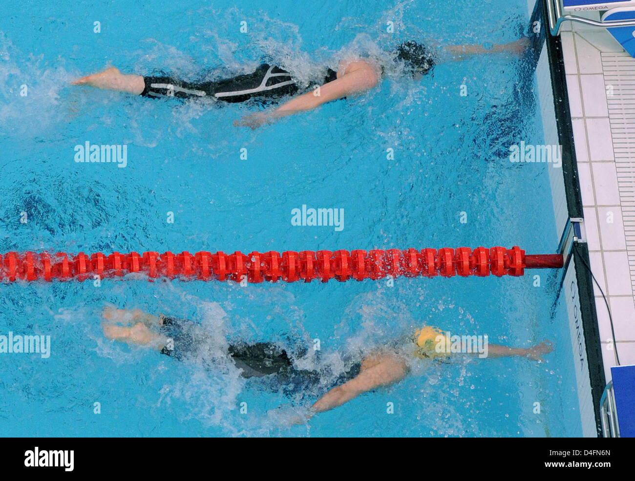 Britta Steffen from Germany (top) competes against Lisbeth Trickett from Australia during the women's swimming 100m freestyle final at the Beijing 2008 Olympic Games in Beijing China, 15 August 2008. Steffen won in 53.12 seconds and set up a new olympic record. Photo: Bernd Thissen dpa ###dpa### Stock Photo