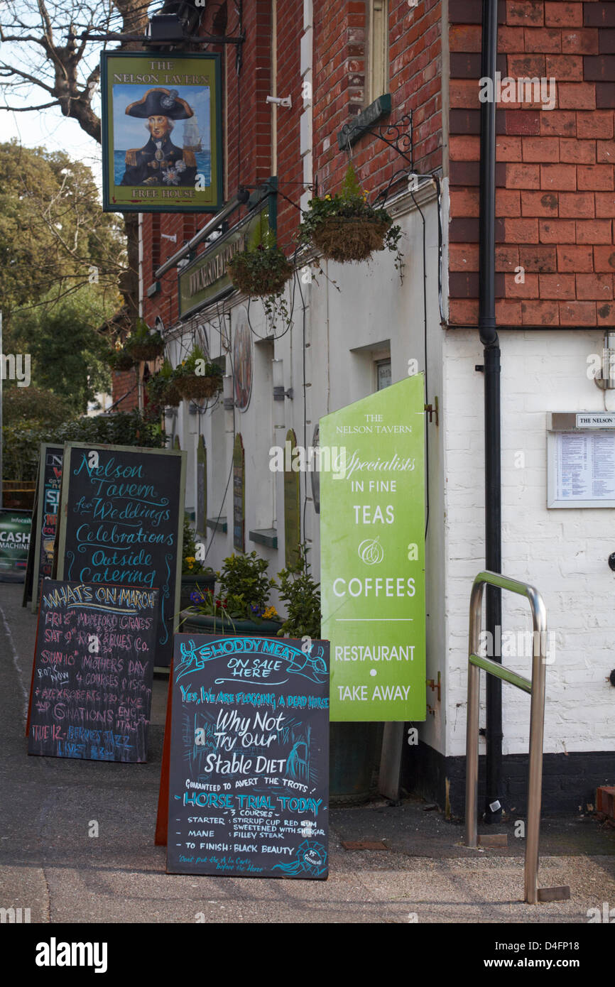 Mudeford, Dorset, UK. 13 March 2013.  The Nelson Tavern at Mudeford offer the real thing and put horse meat on the menu; advertising board outside with horse gags ' shoddy meat on sale here, why not try our stable diet, guaranteed to avert the trots, horse trial today, don't put the a la carte before the horse, 3 courses - starter: stirrup cup red rum sweetened with shergar, mane: fillet steak, to finish: black beauty, 15 guineas.' Credit: Carolyn Jenkins / Alamy Live News Stock Photo