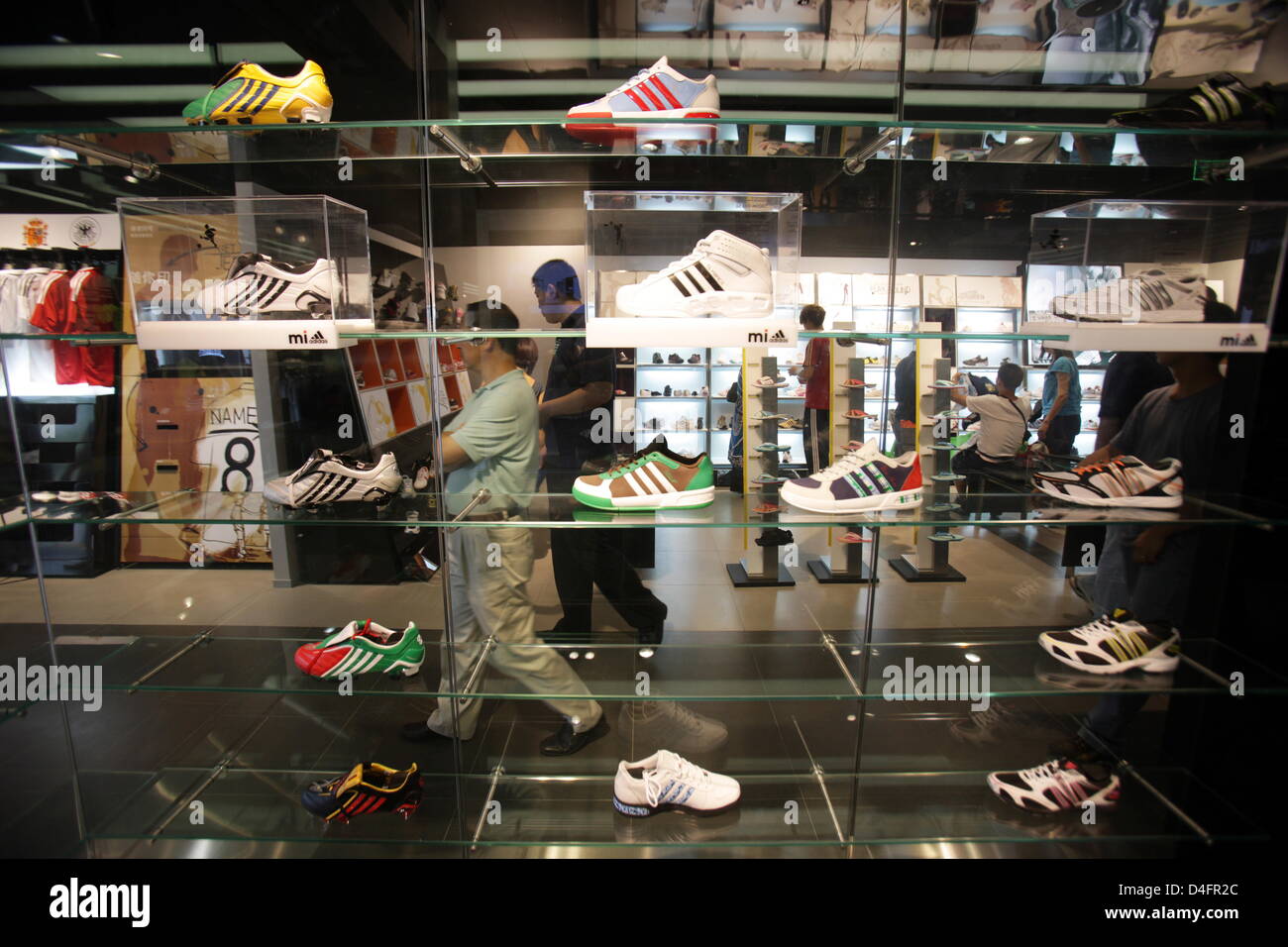 An interior view of the new 'Adidas Brand Center', so far the world's largest adidas store, in Beijing, China, 19 August 2008. The store covers 3,170sqm and four storeys of 'Sanlitun Village Shopping Center'. Photo: Federico Gambarini Stock Photo
