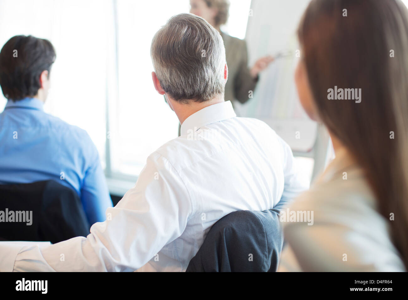 Business people sitting in meeting Stock Photo