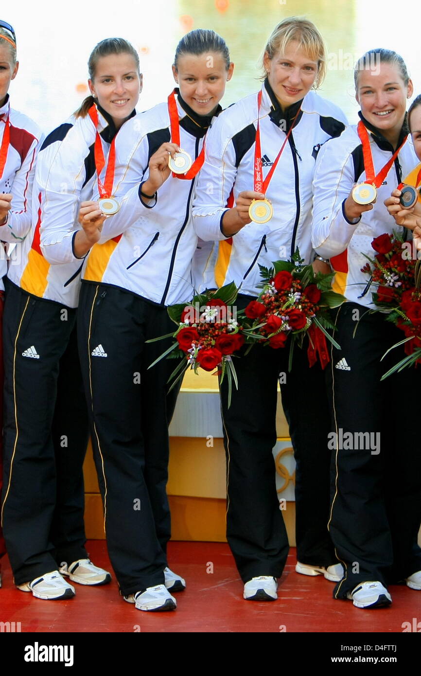 Fanny Fischer (L-R), Nicole Reinhardt, Katrin Wagner-Augustin, Conny Wassmuth celebrate their Gold Medal for Kayak Four (K4) 500m Women Final at Shunyi Olympic Rowing-Canoeing Park at the 2008 Beijing Olympic Games, Beijing, China, 22 August 2008. Hungary won Silver, Australia won Bronze. Photo: Jens Buettner dpa ###dpa### Stock Photo