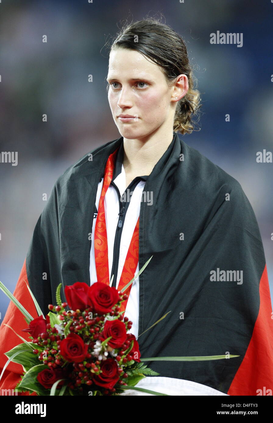 gold-medalist-lena-schoeneborn-of-germany-celebrates-during-the-medal