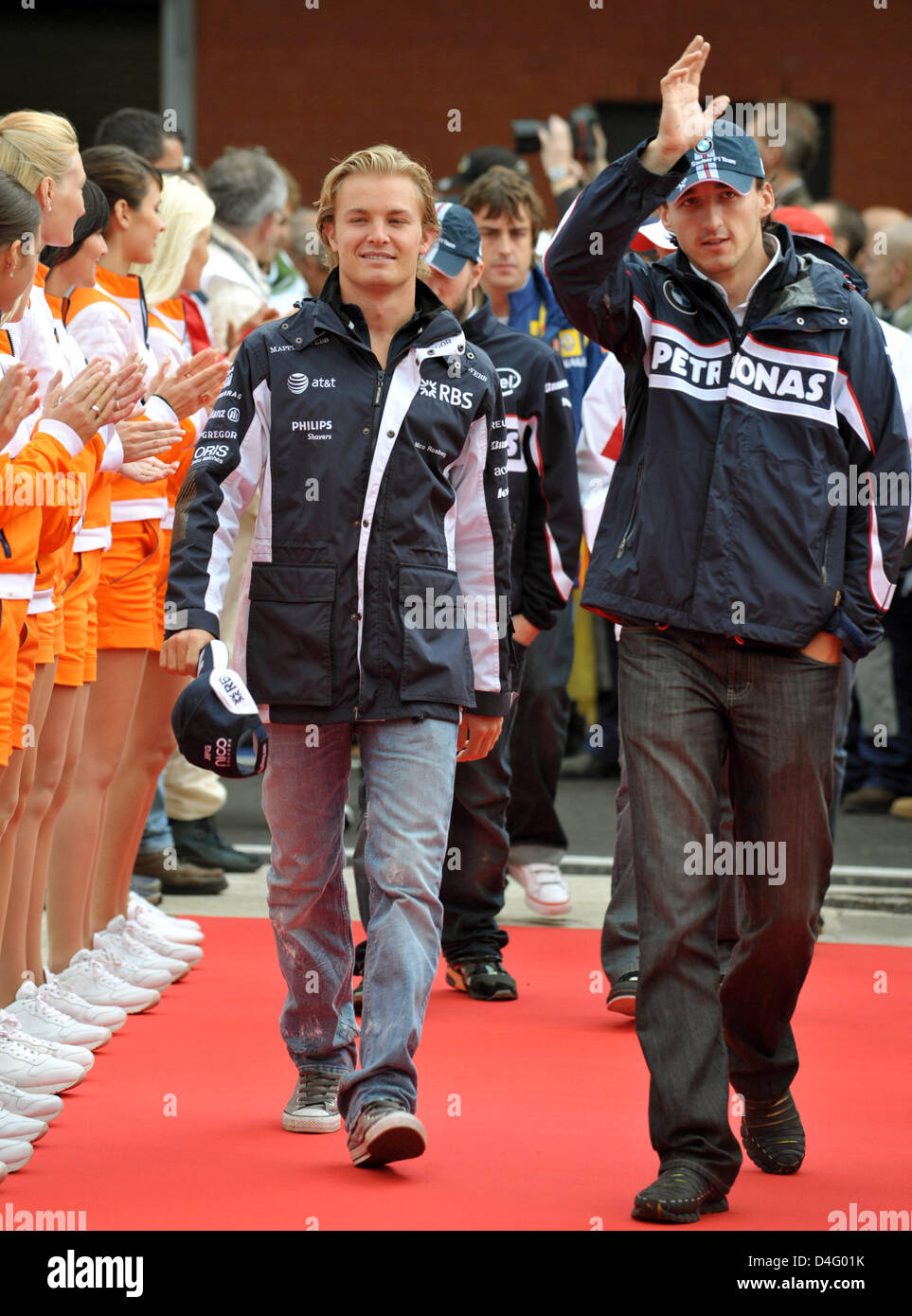 German Formula One driver Nico Rosberg (L) of Williams and Polish Formula One driver Robert Kubica of BMW Sauber are pictured at the drivers parade prior to the start of the Formular One Grand Prix of Belgium at Spa-Francorchamps race tracks in Belgium, 07 September 2008. Foto: Carmen Jaspersen Stock Photo