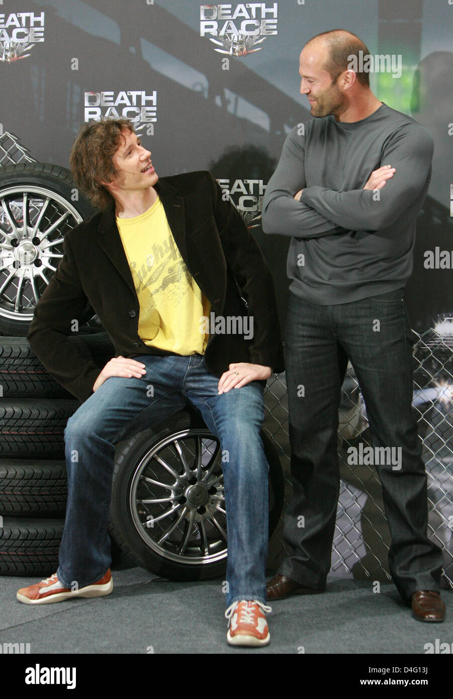 British actors Paul W.S. Anderson (L) and  Jason Statham pose during the photocall for the movie 'Death Race' in Berlin, Germany, 11 September 2008. The remake of trash classic 'Death Race 2000', in which prisoners attend a jail-race, will premiere in German cinemas on 27 November 2008. Photo: JENS KALAENE Stock Photo