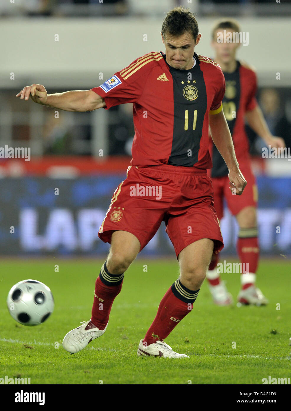 German player Miroslav Klose plays the ball during the World Cup qualification match at the Olympic stadium in Helsinki, Finland, 10 September 2008. The match tied 3-3. Photo: Achim Scheidemann Stock Photo