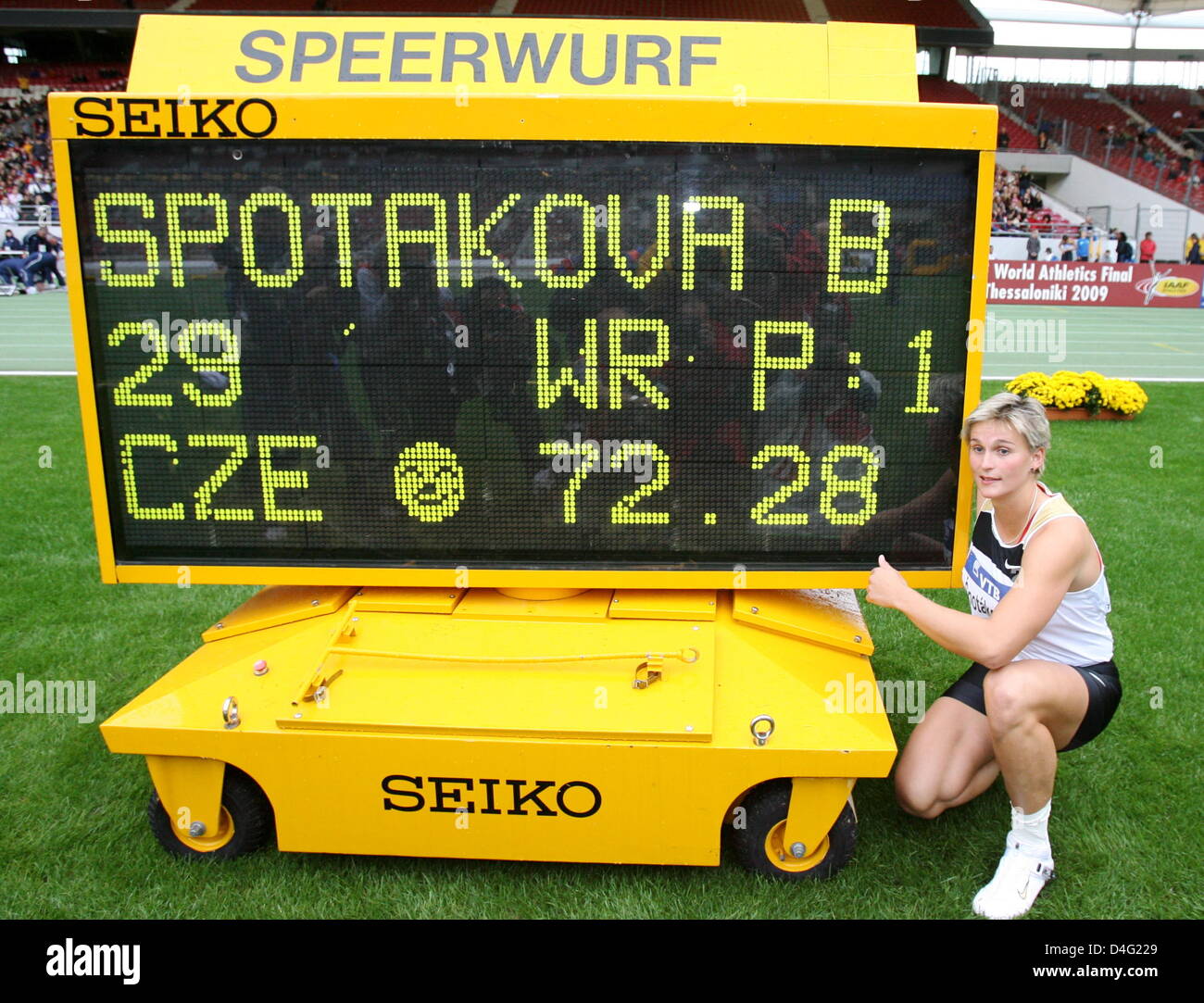Czech javelin thrower Barbora Spotakova poses next to the display board
