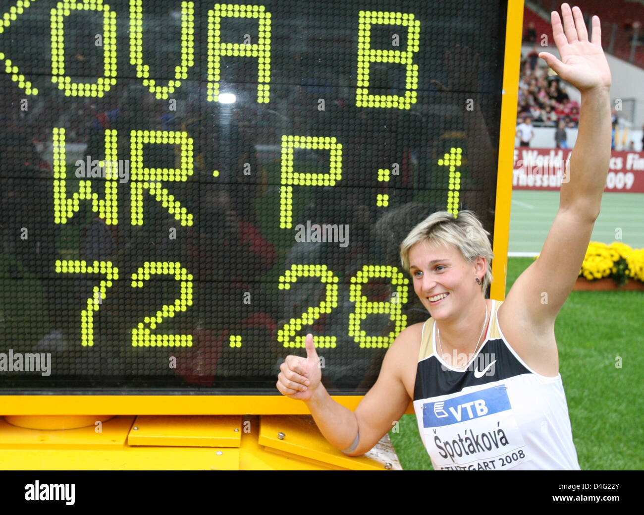 Czech javelin thrower Barbora Spotakova poses next to the display board