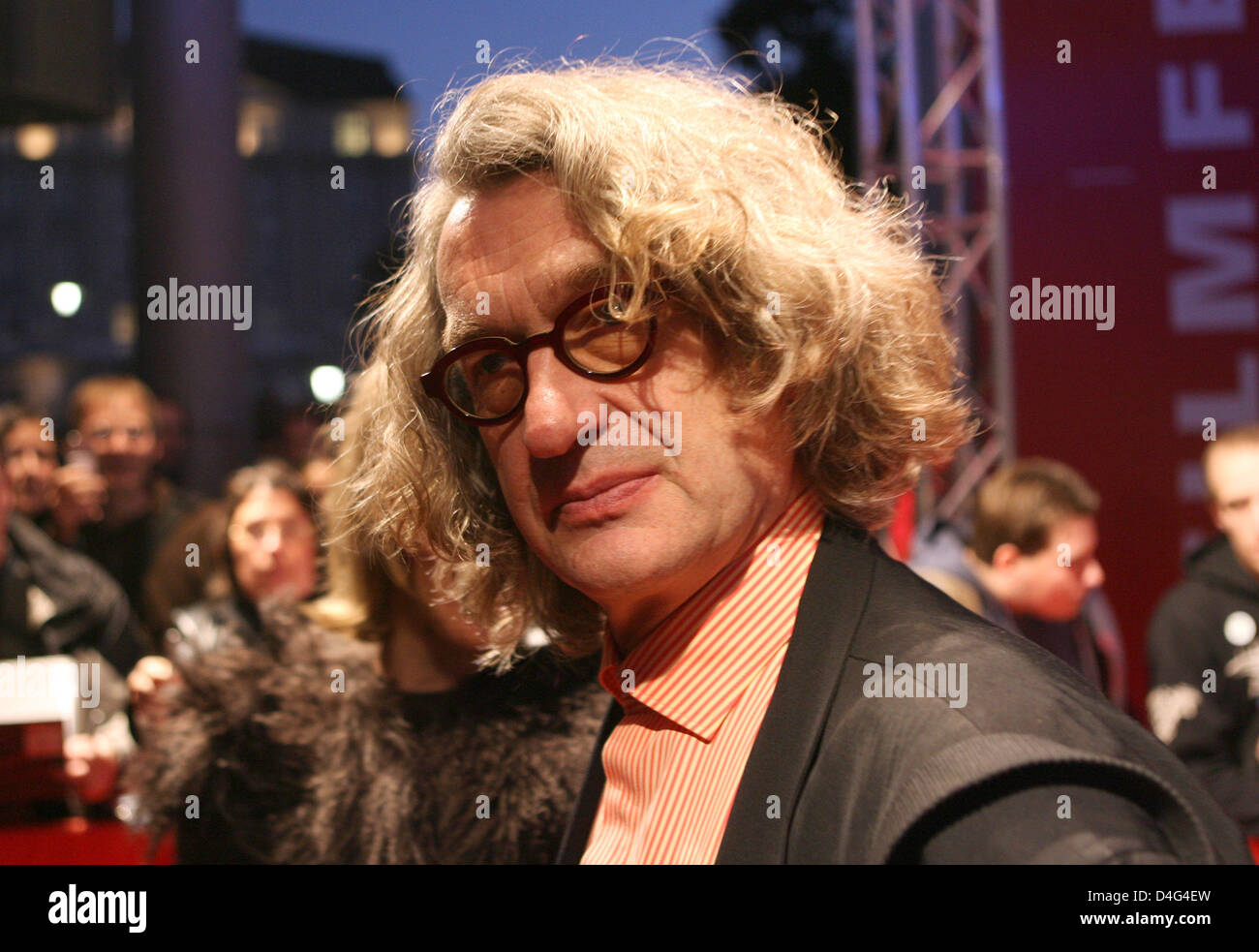 Director Wim Wenders stands in front of CinemaxX Cinema prior to the