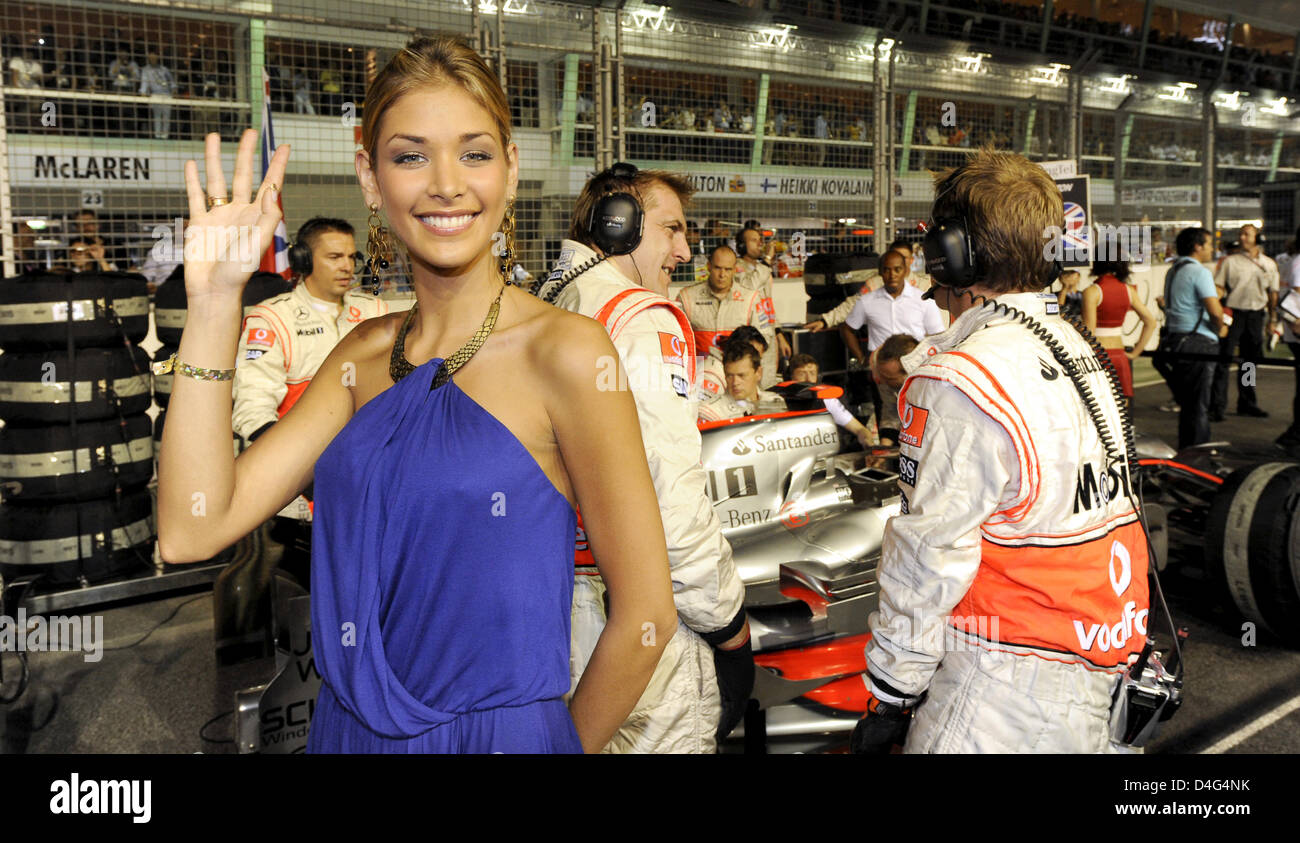 Miss Universe 2008, Dayana Mendoza of Venezuela, poses at the grid before the start of the Singapore Grand Prix at the Marina Street Circuit in Singapore, 28 September 2008. Singapore will host the Grand Prix street circuit race for the first time on 28 September. Photo: JENS BUETTNER Stock Photo