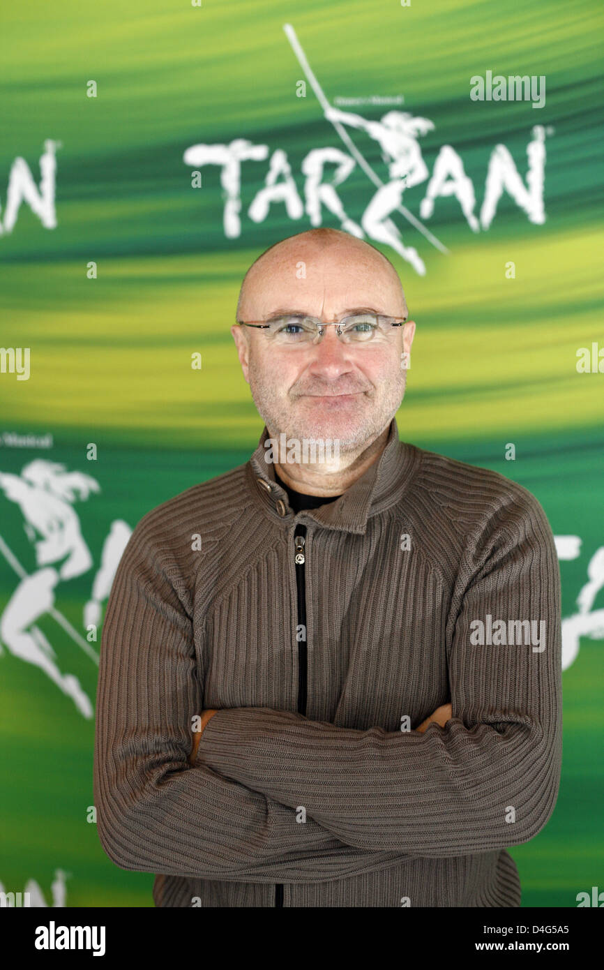 English musician Phil Collins poses with the poster of the new Disney musical 'Tarzan' in Hamburg, Germany, 02 October 2008. The show with music by Collins premieres in Hamburg on 19 October 2008. Photo: SEBASTIAN WIDMANN Stock Photo