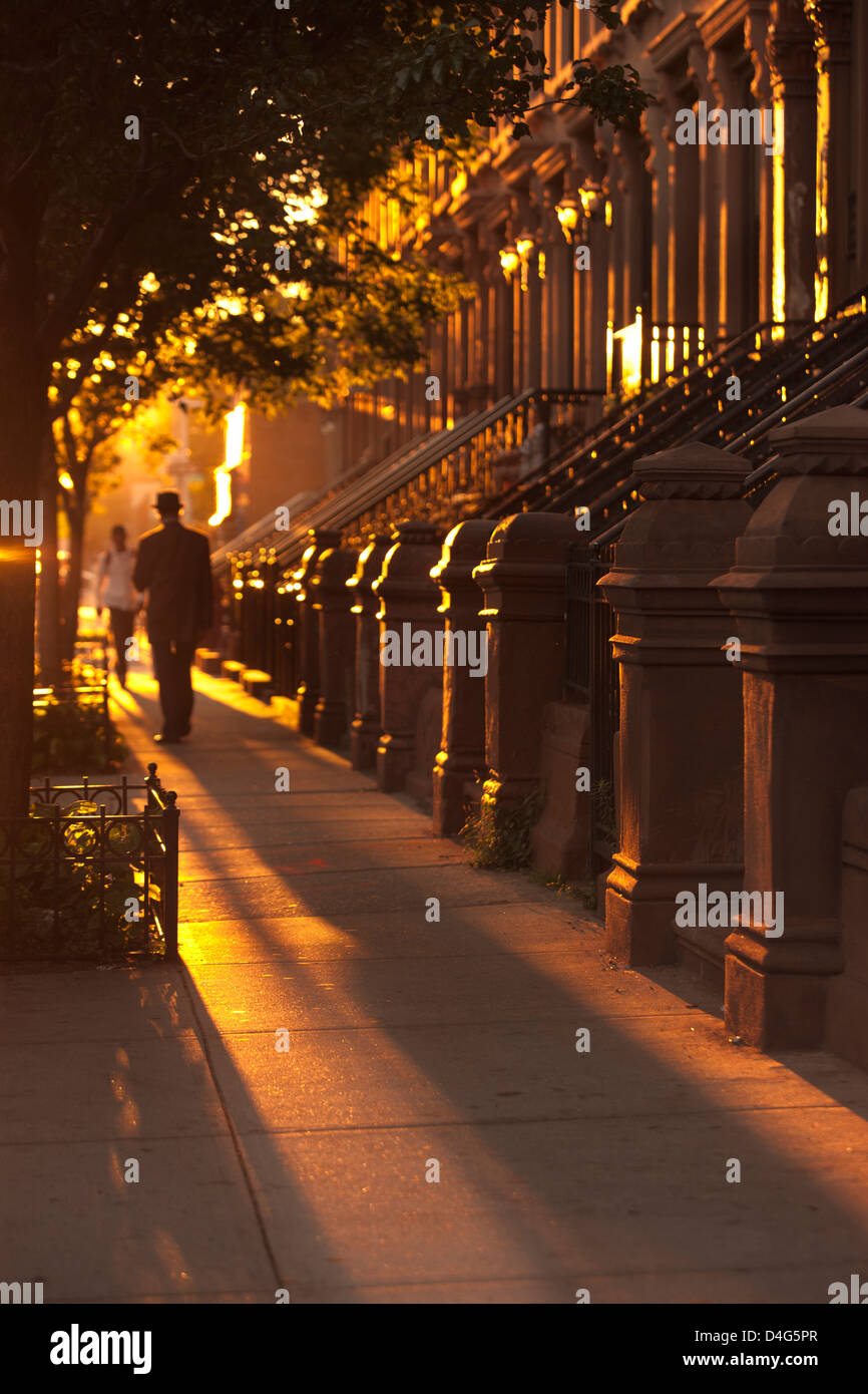 BROWNSTONE ROW HOUSES ONE HUNDRED AND TWENTY SIXTH STREET HARLEM MANHATTAN NEW YORK CITY USA Stock Photo