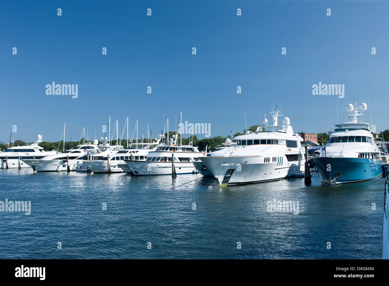 ROW OF MOTOR YACHTS SAG HARBOR MARINA LONG ISLAND NEW YORK STATE USA Stock Photo