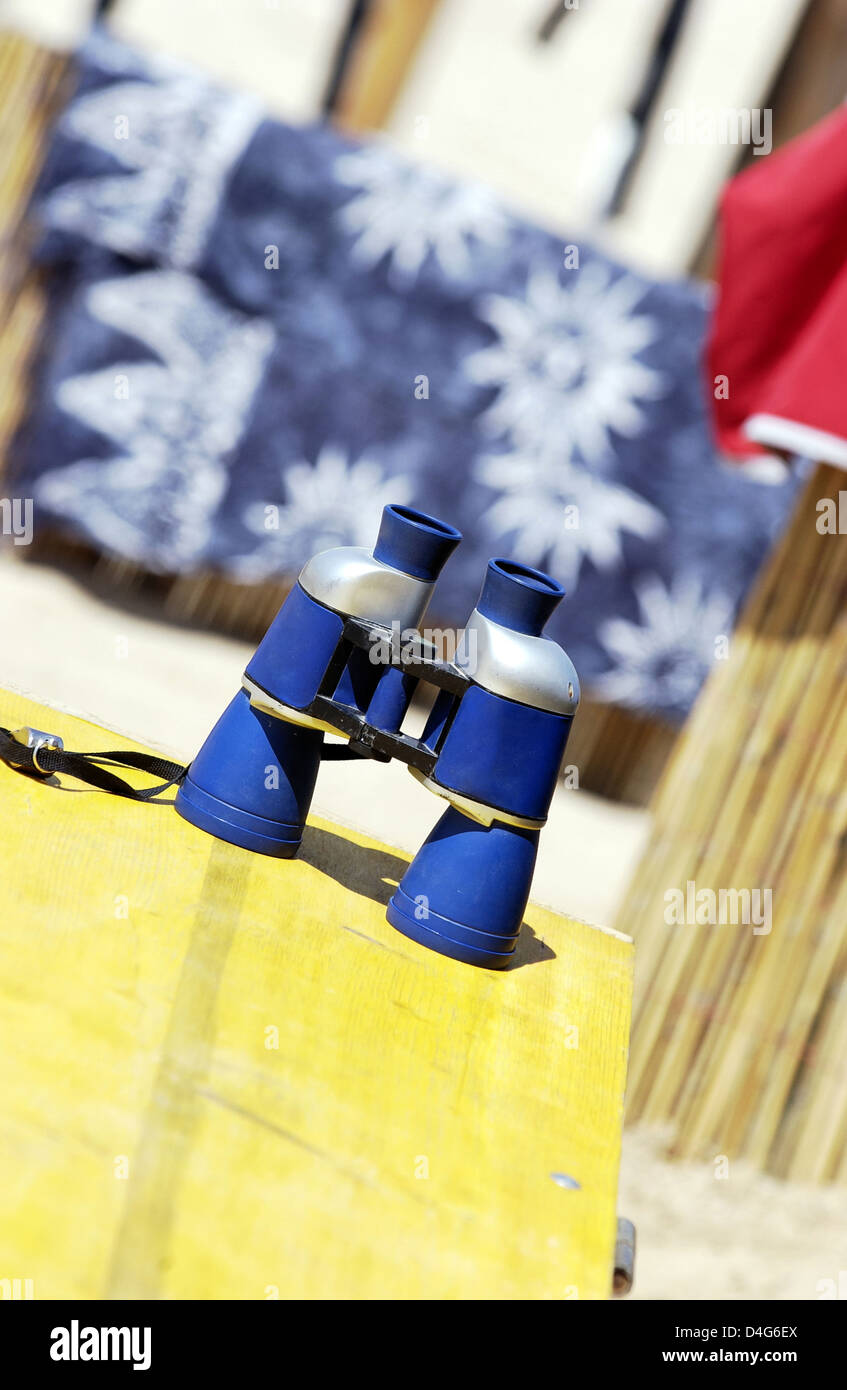 Binoculars at the beach Stock Photo Alamy