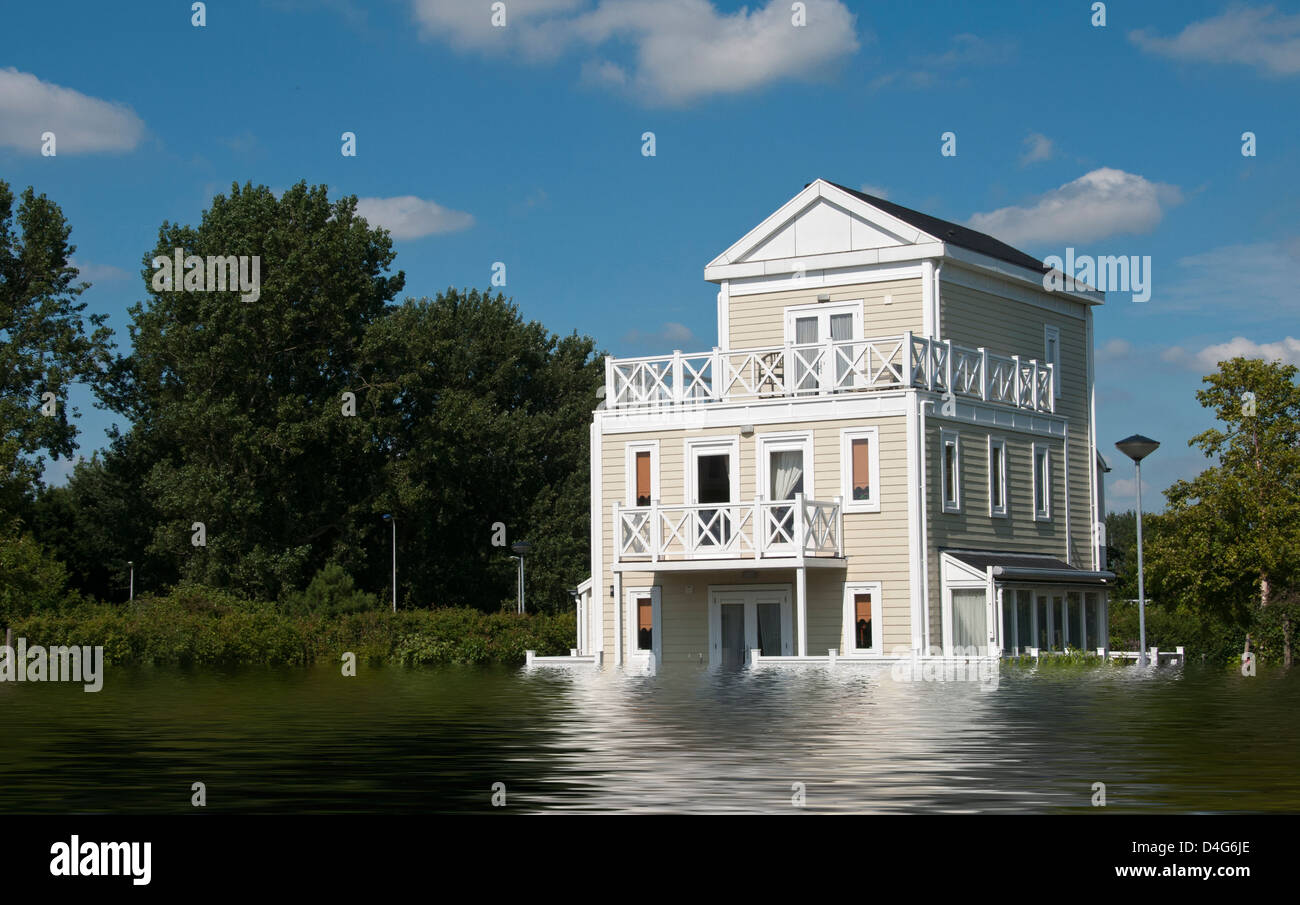 big wooden house with blue sky and white clouds in high water Stock Photo