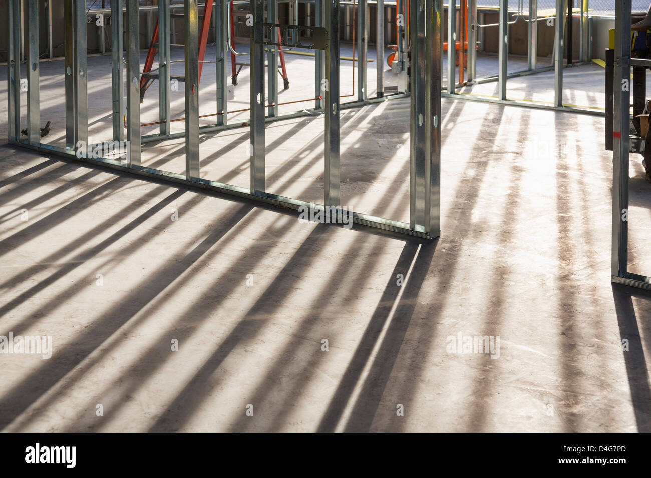 Commercial building under construction. Partition walls with light