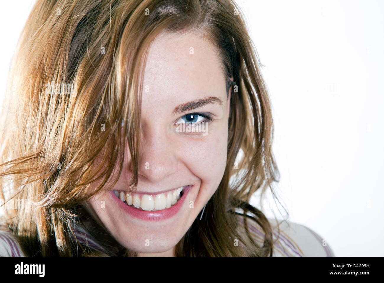 young beautuful girl smiling at the camera Stock Photo - Alamy