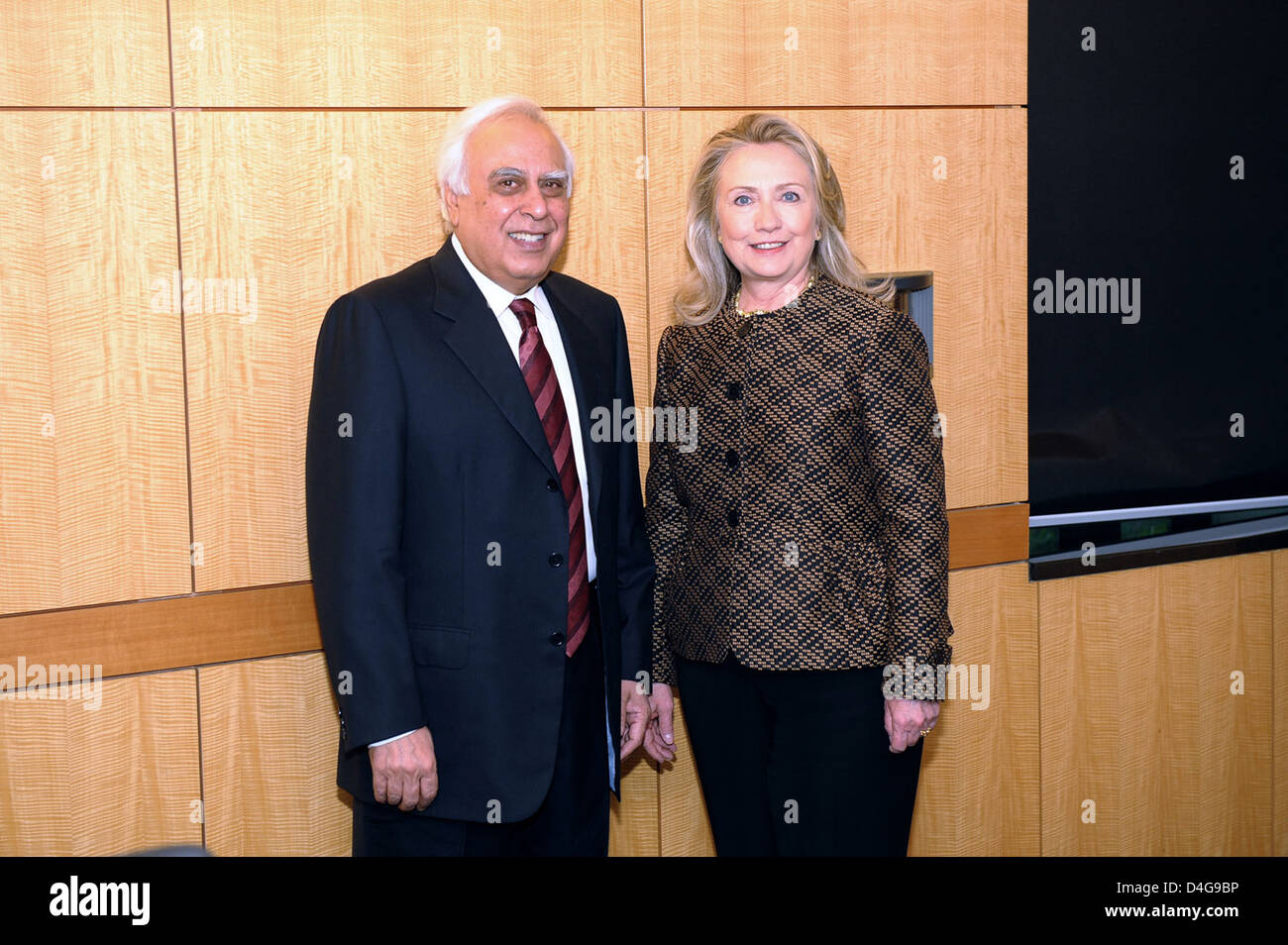 Secretary Clinton Poses for a Photo With Indian Minister for Human Resource Development Kapil Sibal Stock Photo