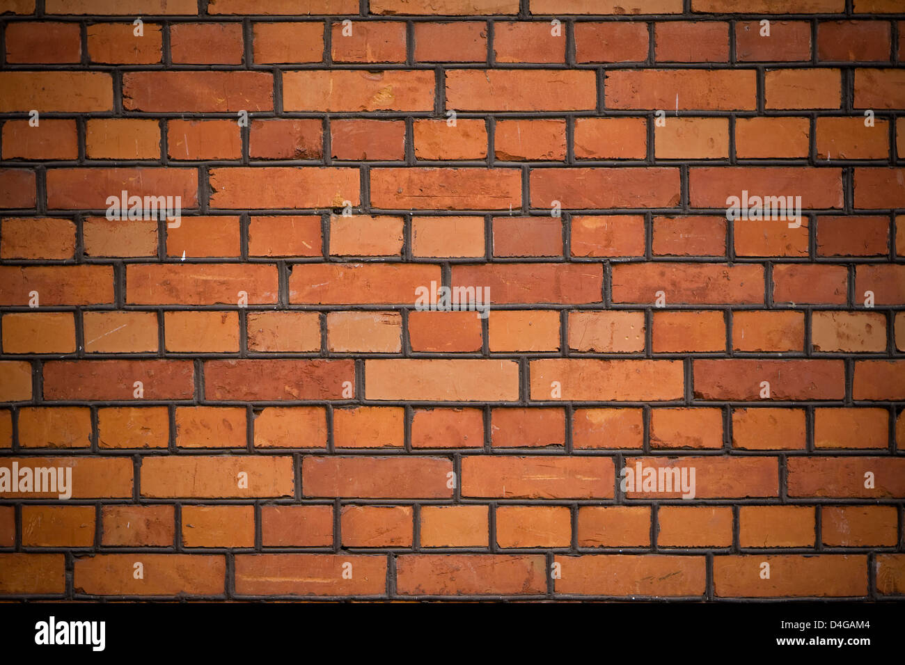 The facade view of the old brick wall for design background. Stock Photo
