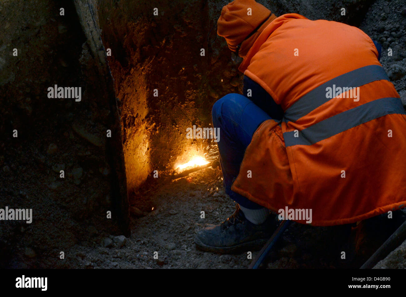 Male welder worker wearing protective clothing Stock Photo