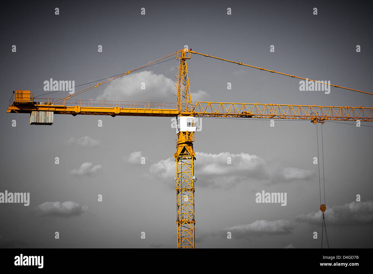 Construction crane against a blue sky with cloud background Stock Photo ...