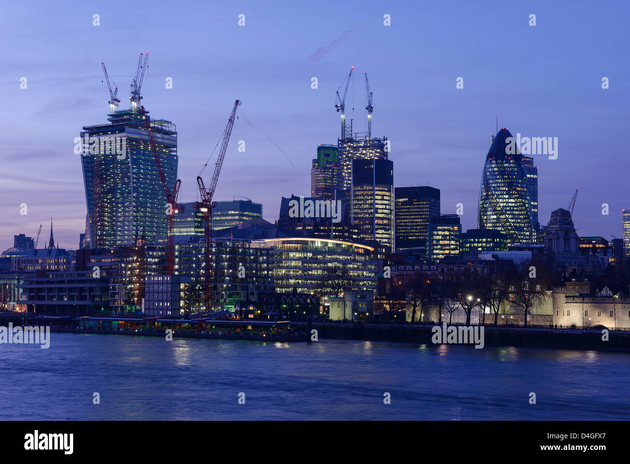 The CIty of London financial district at night UK Stock Photo