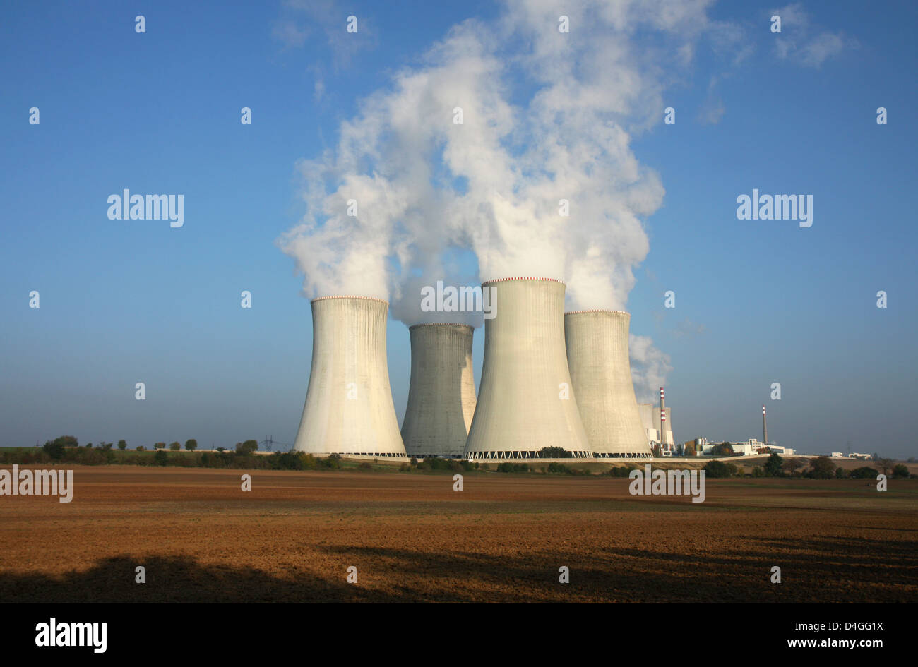 nuclear power plant and agriculture field Stock Photo