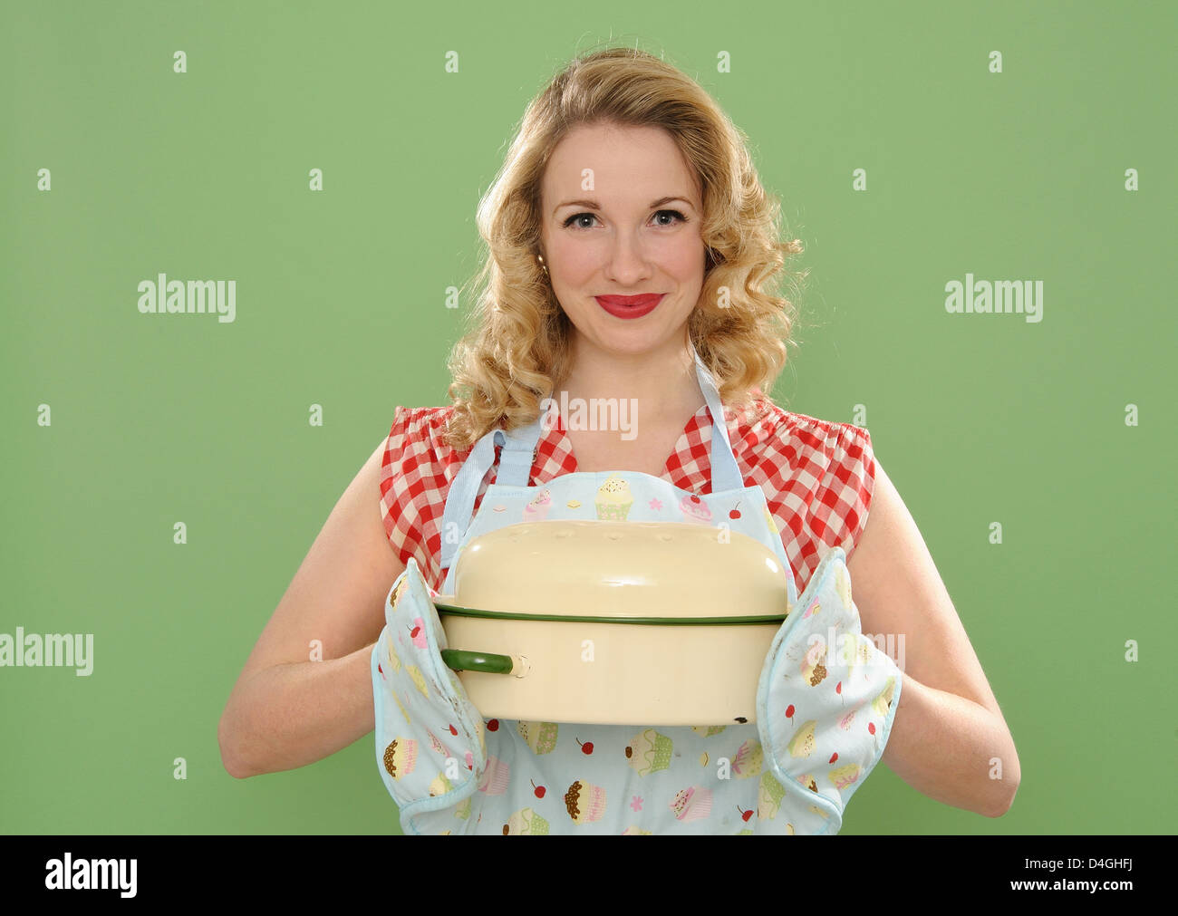 Woman holding casserole dish Stock Photo