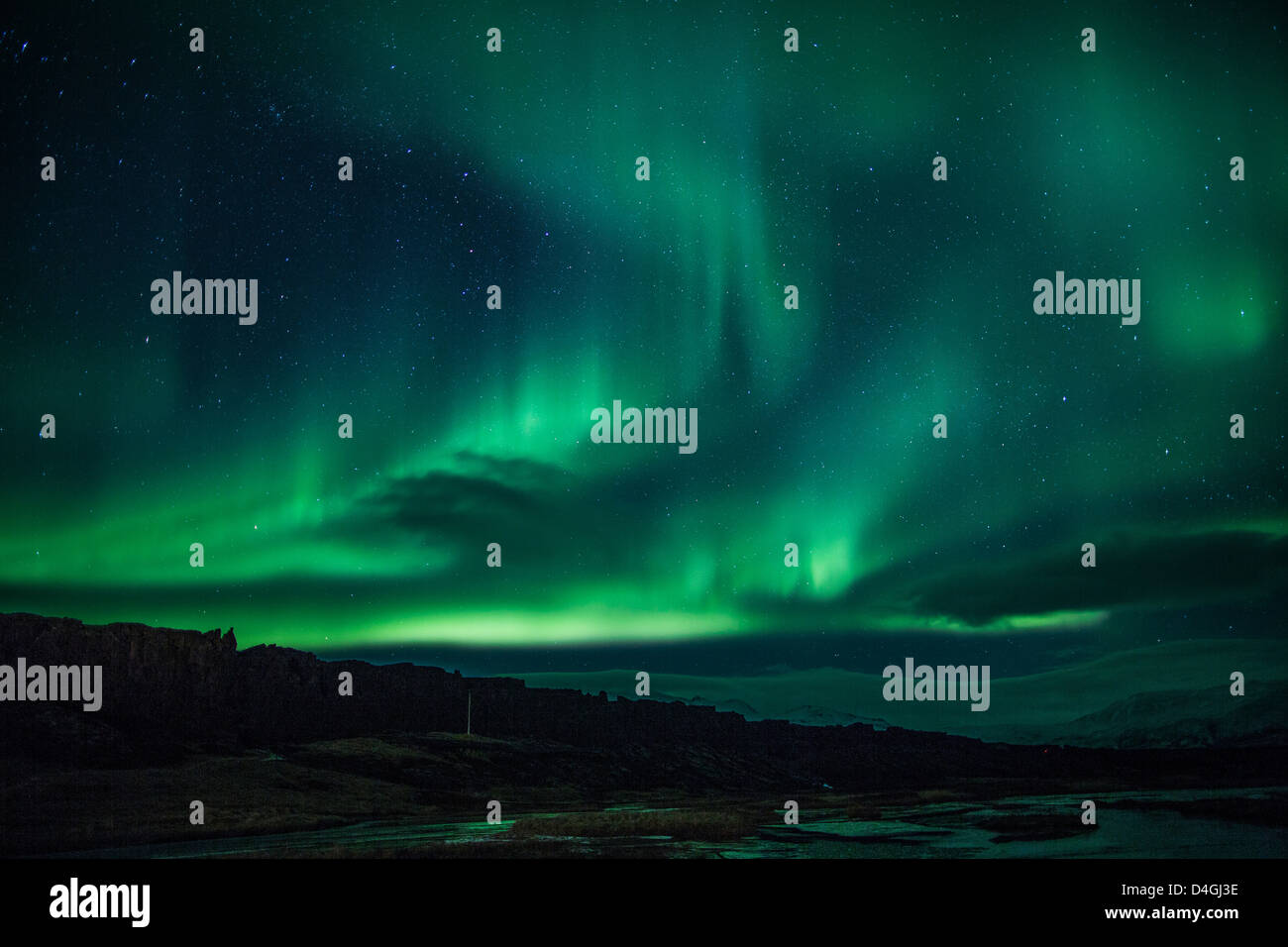 Northern lights (Aurora borealis) over Iceland lagoon Stock Photo Alamy