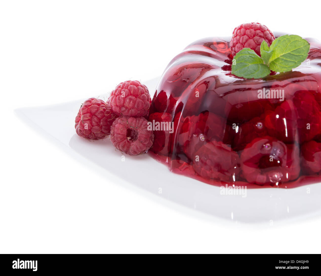 Raspberry Jello with fresh fruits isolated on white background Stock ...