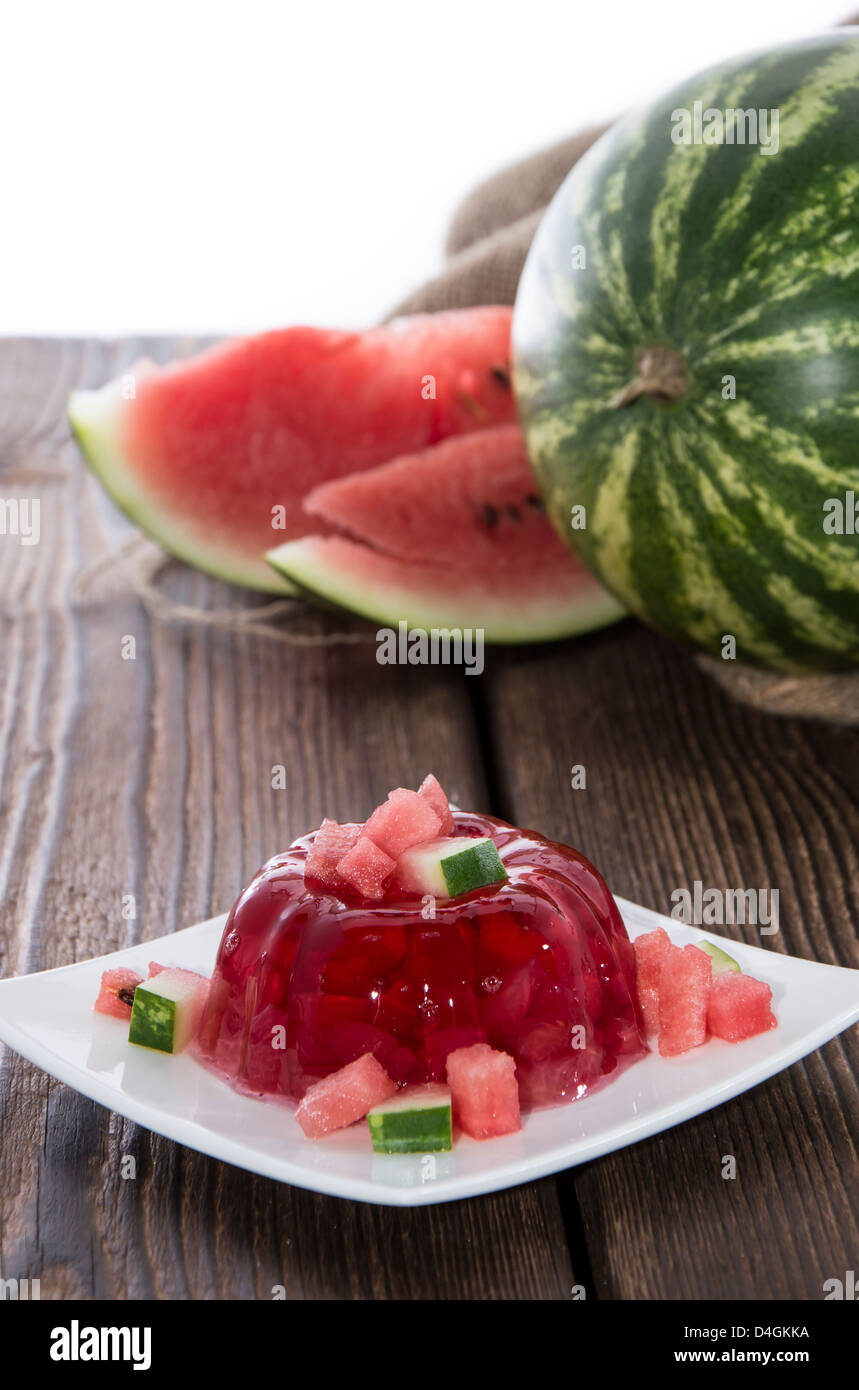 Watermelon Jello with fresh fruit pieces isolated on white background