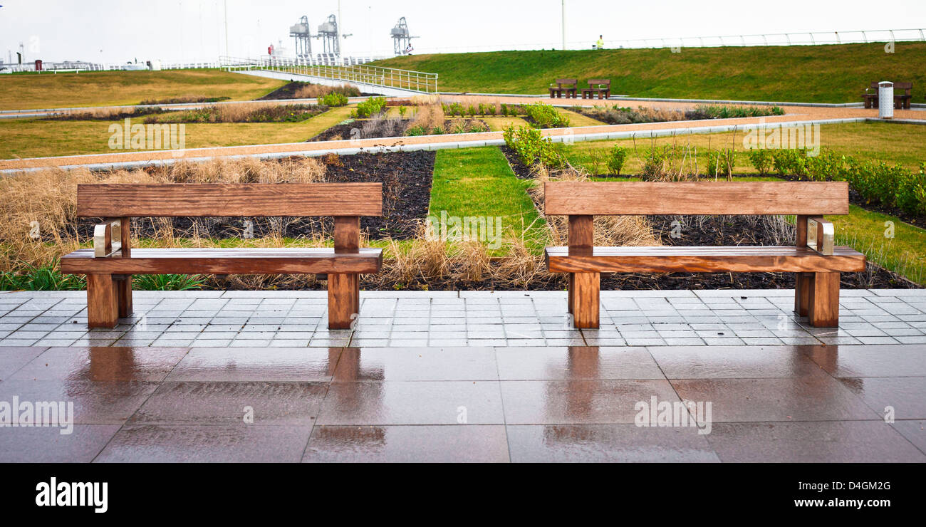 Two Wooden Benches In A Modern Garden Stock Photo Alamy