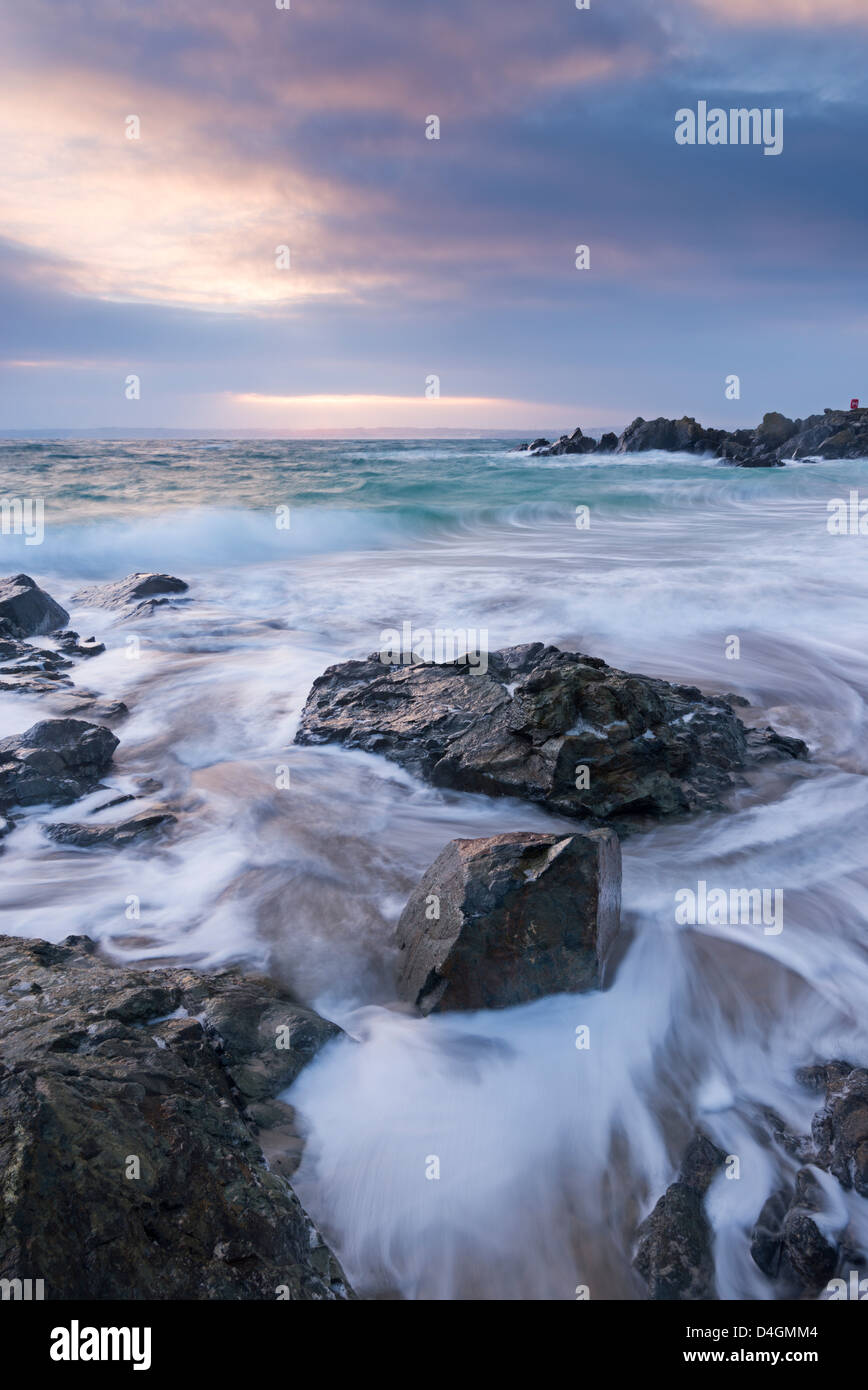 Sunrise at Porthgwidden Beach in St Ives, Cornwall, England. Winter (March) 2013 Stock Photo