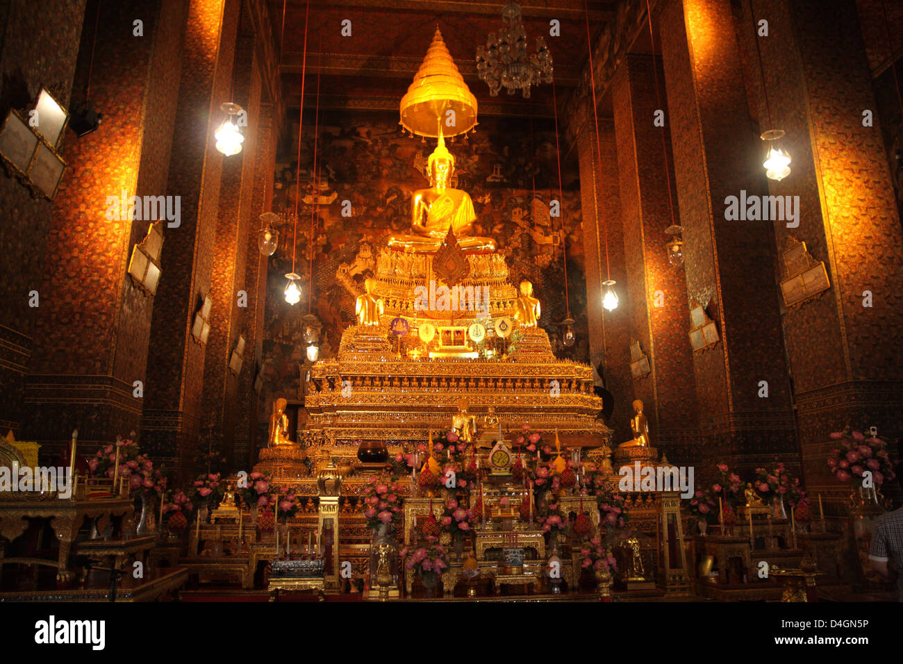 Golden Buddha statue at Wat Pho temple , Bangkok , Thailand Stock Photo ...
