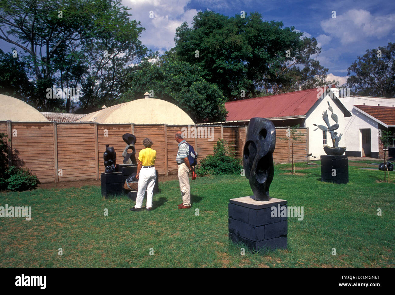 tourists, buying, Shona sculpture, Shona statue, Chapungu Sculpture Park, city of Harare, Harare, Harare Province, Zimbabwe, Africa Stock Photo